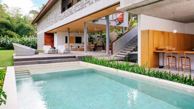 a villa in Sanur with traditional architecture that blends well with modern interiors
