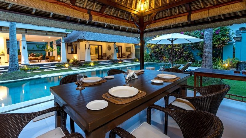 traditionally decorated dining area of villa gils overlooking the pool