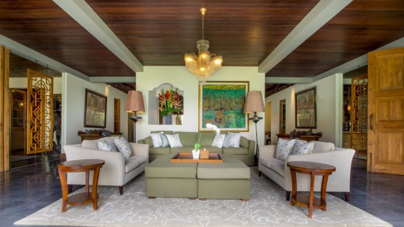 spacious living area with hefty couches and sofas